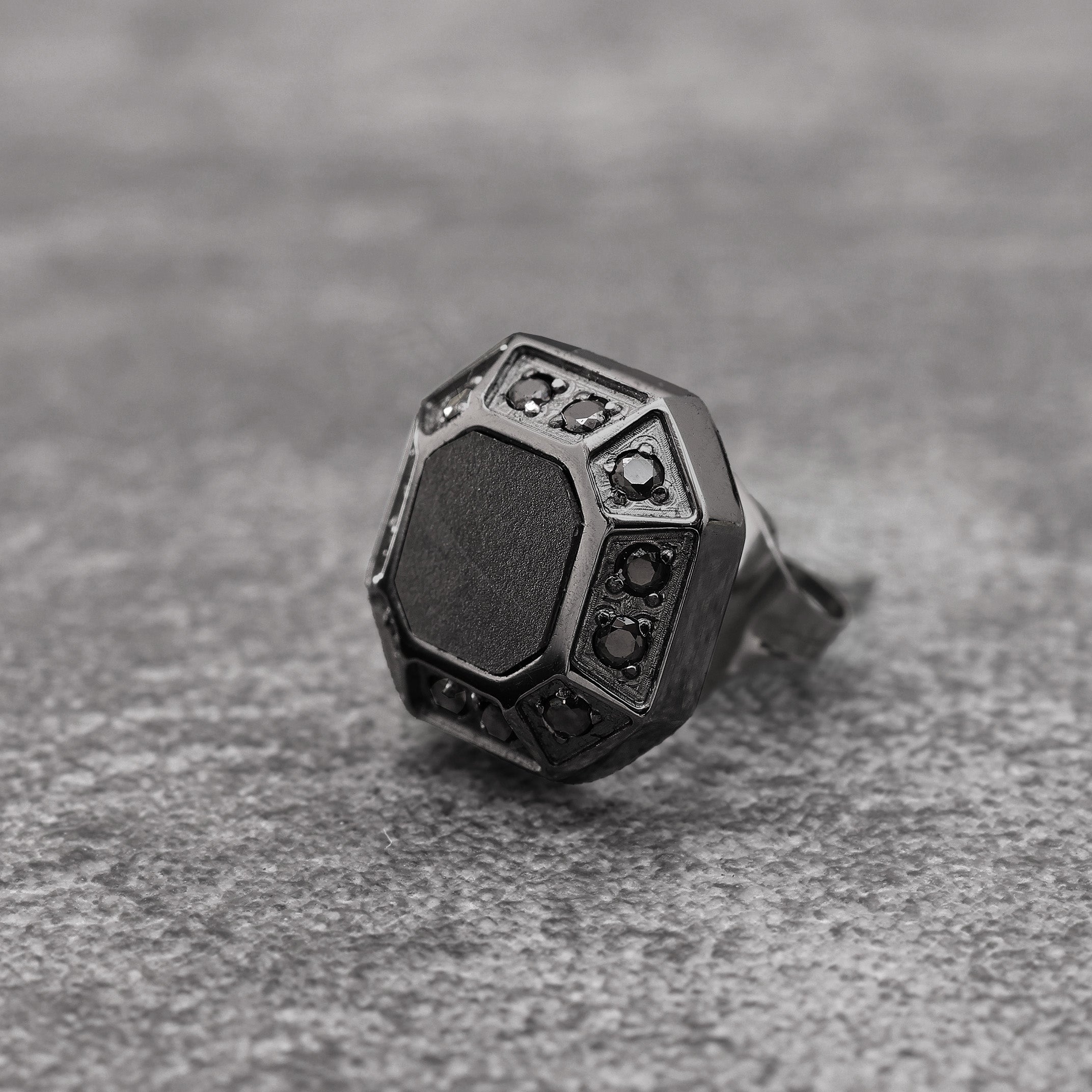 Close-up of Black Rhodium Plated Diamond Hex Stud Earring showing black zircon stones and hexagonal design