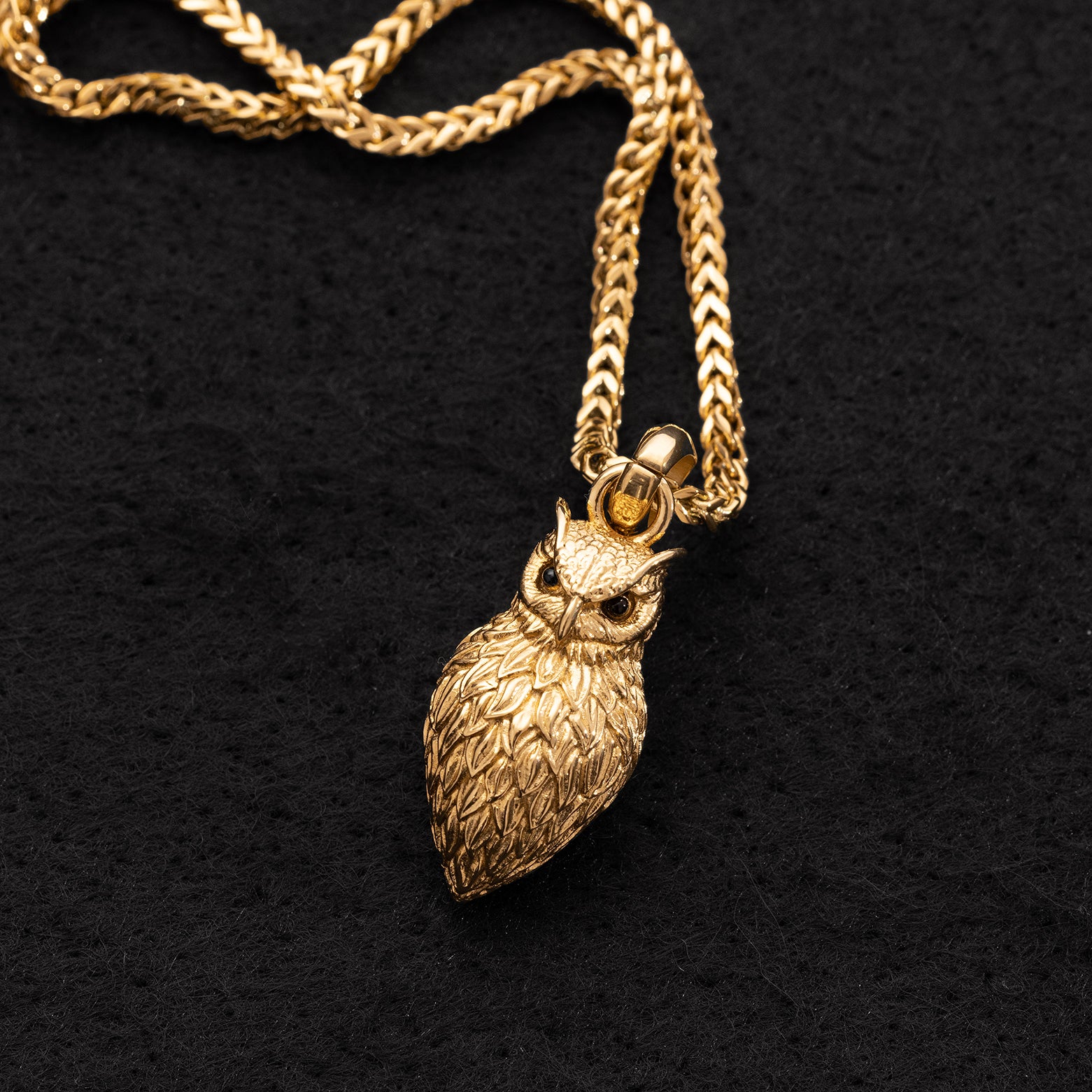 Close-up of Julivno Owl Pendant 28mm highlighting polished finish and detailed design