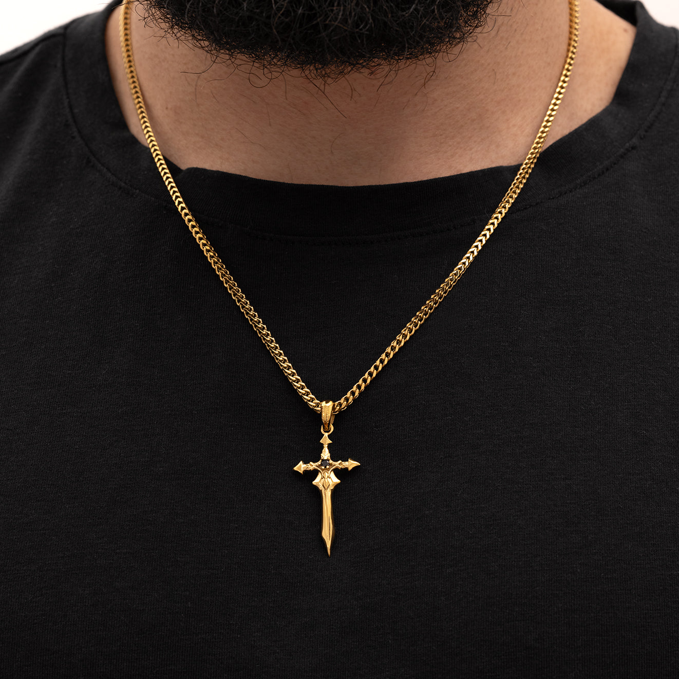 Men wearing Julivno Sword Pendant 35mm with 18K Gold Plated finish and Black Zircon