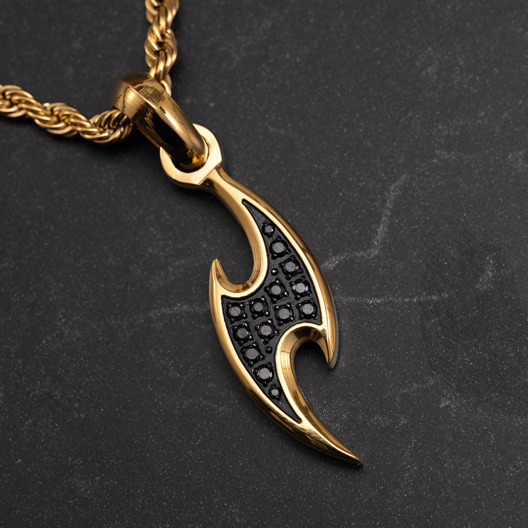 Luxury ninja knife pendant with black zircon and sharp angular design