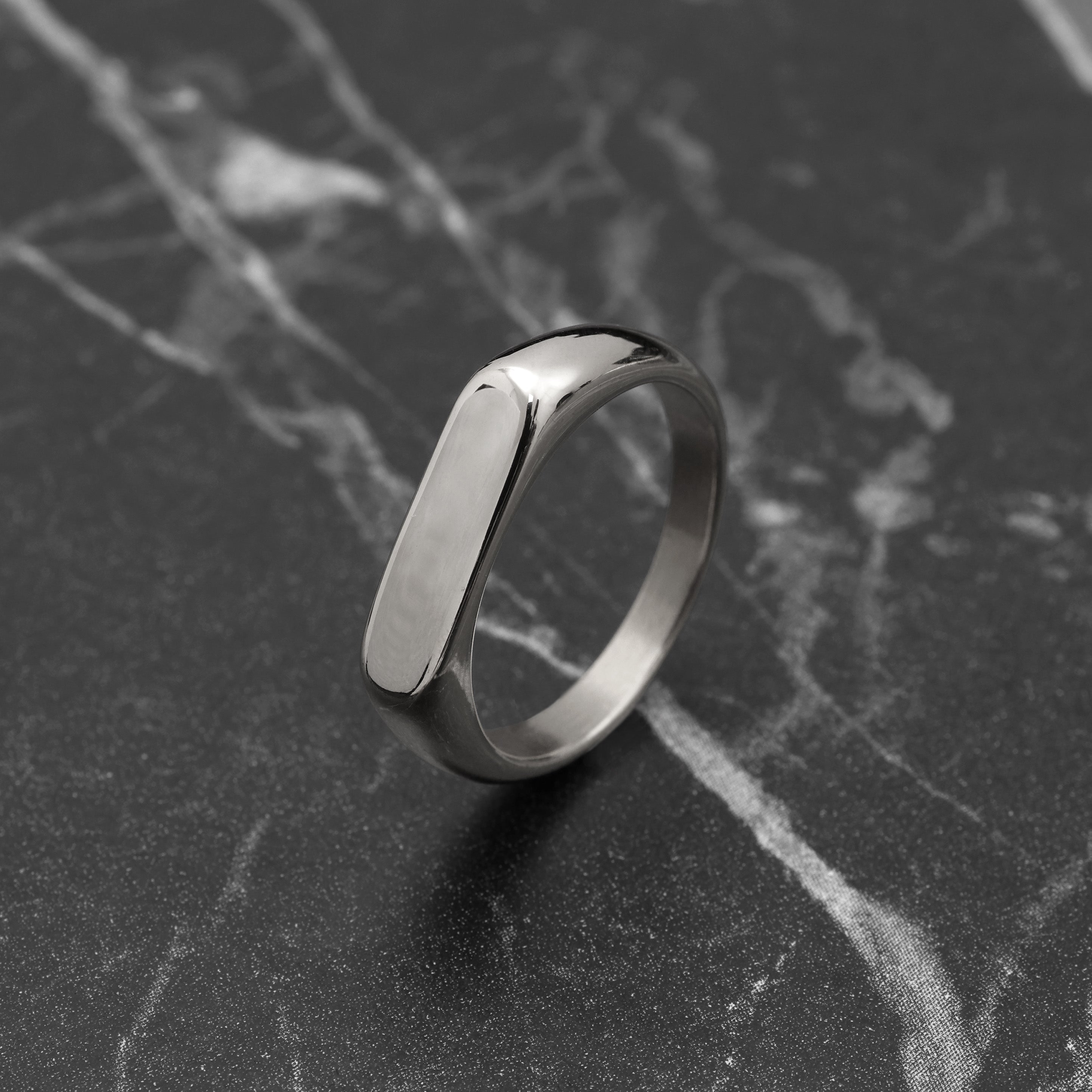 Close-up of silver Minimal Ring showing smooth minimalist band design