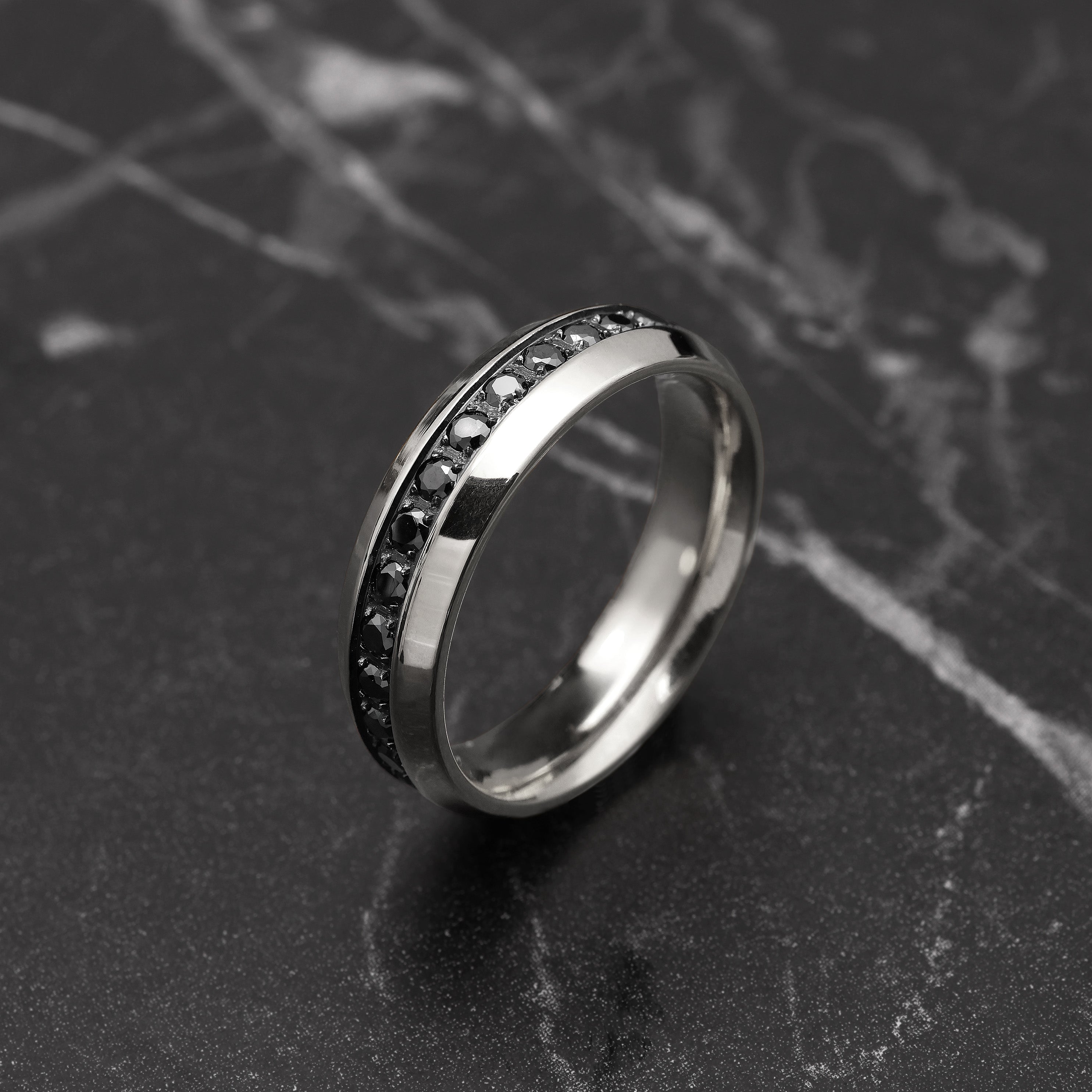 Close-up of White Gold Plated Classic Diamond Ring showing black zircon stones and refined band design