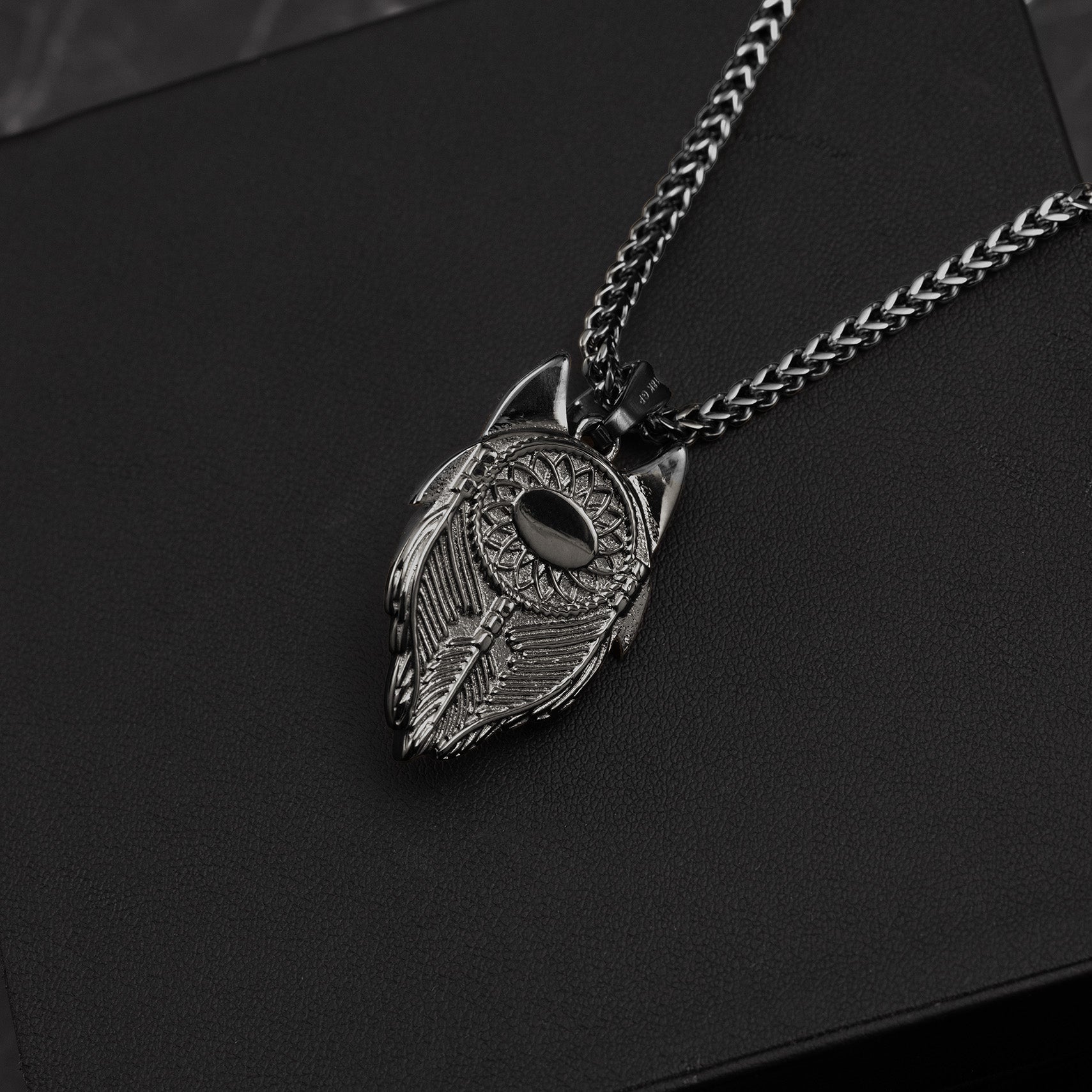pendant necklace on a black background