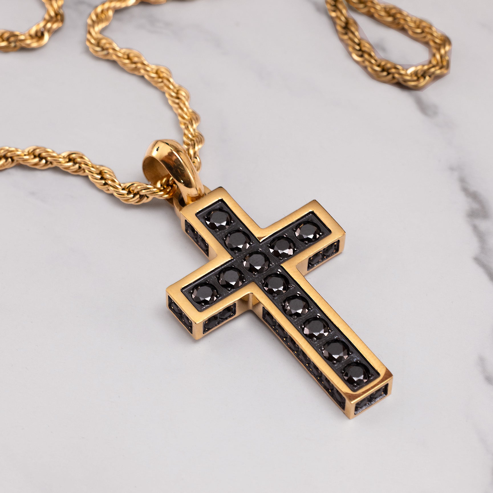 Luxury gold plated cross pendant with black zircon detailing