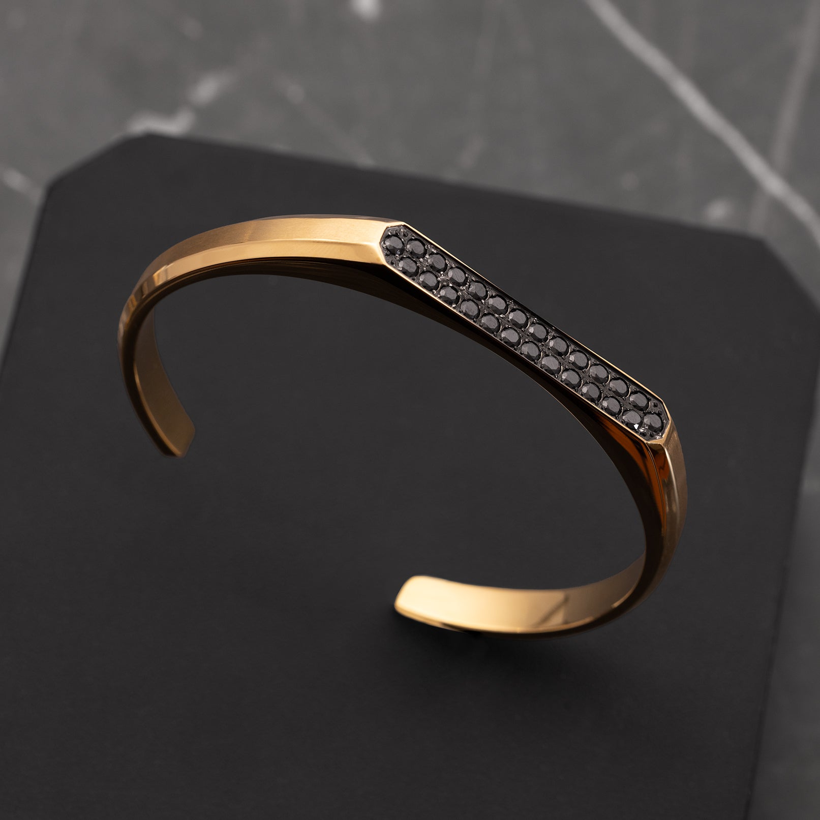 Premium menโs gold cuff bracelet with black zircon accents