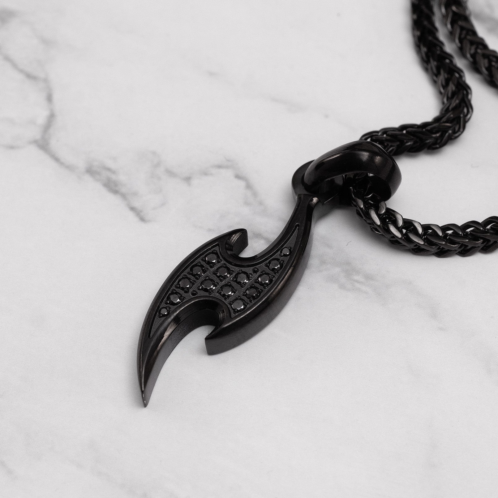 Luxury black ninja knife pendant with sharp angular design