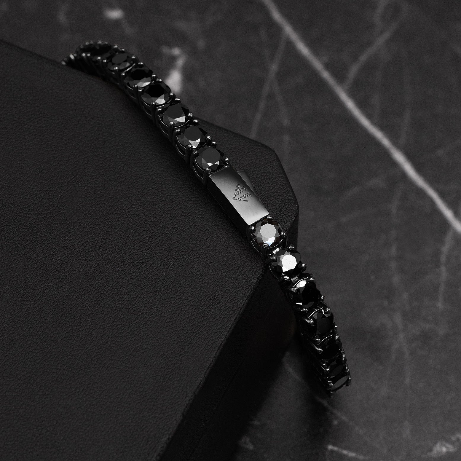 Luxury black tennis bracelet with prong-set links