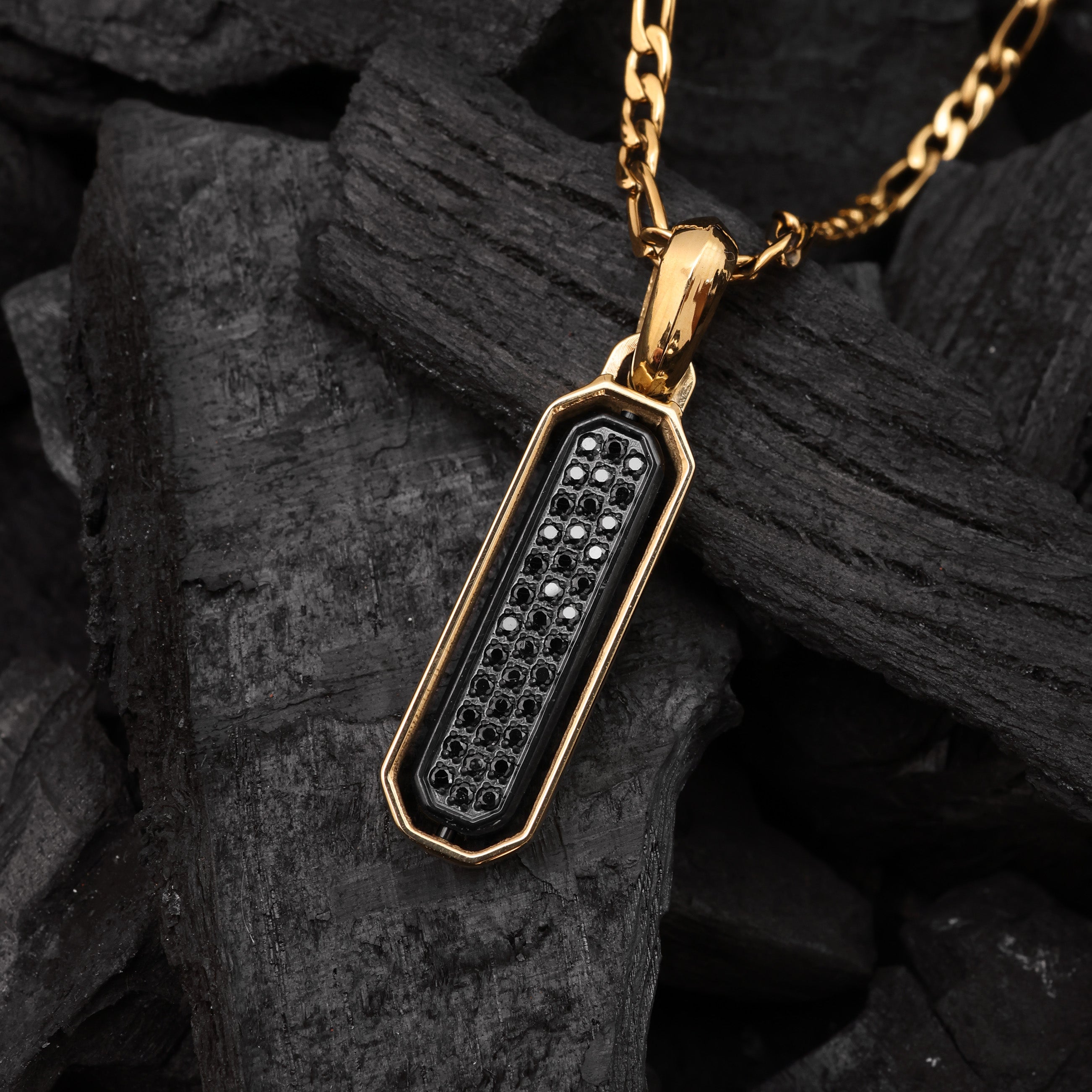 Close-up of Gold Plated Diamond Flip Bar Pendant showing black zircon stone and hexagonal frame design