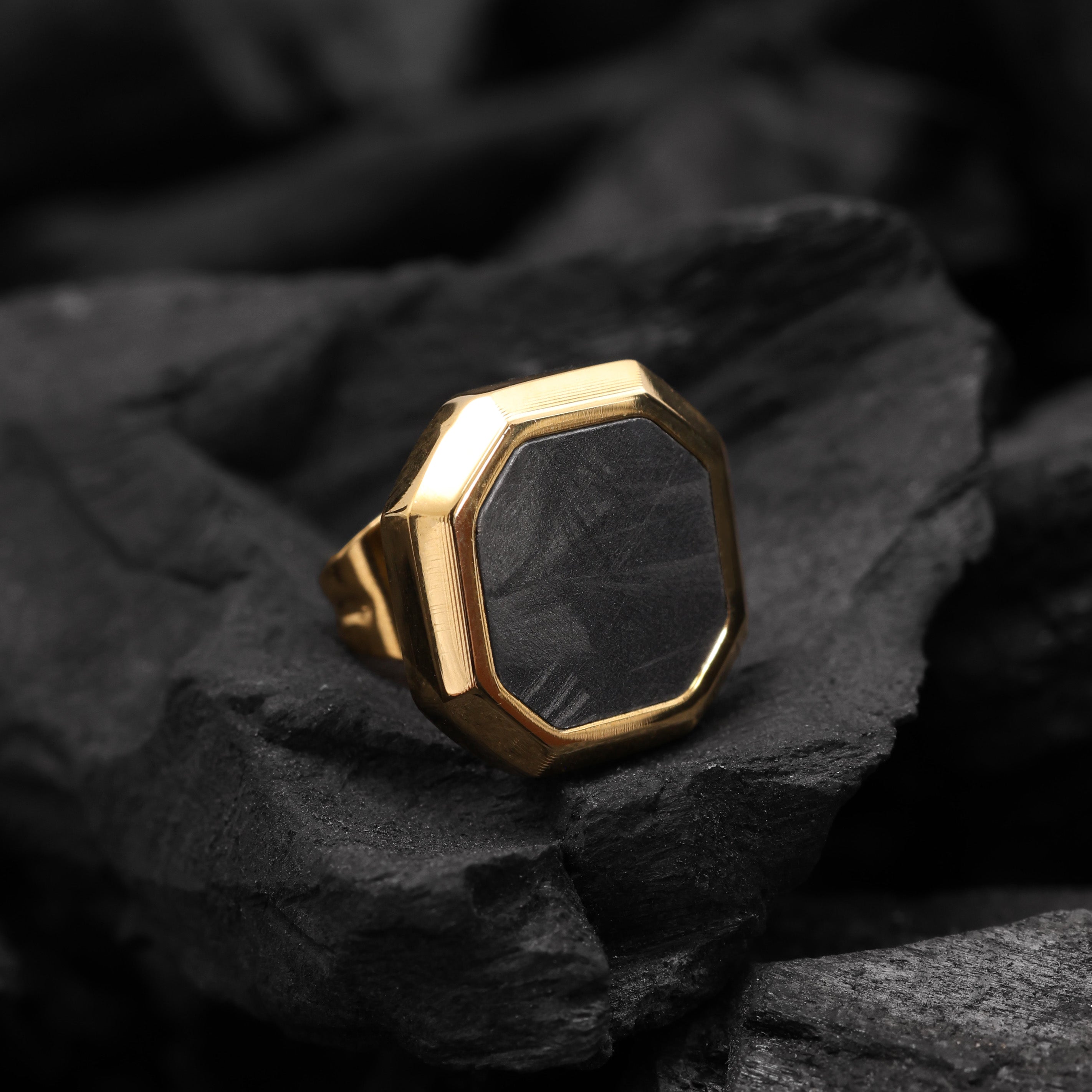 Close-up of Gold Plated Hex Stud Earring showing matte black enamel and geometric hexagon design