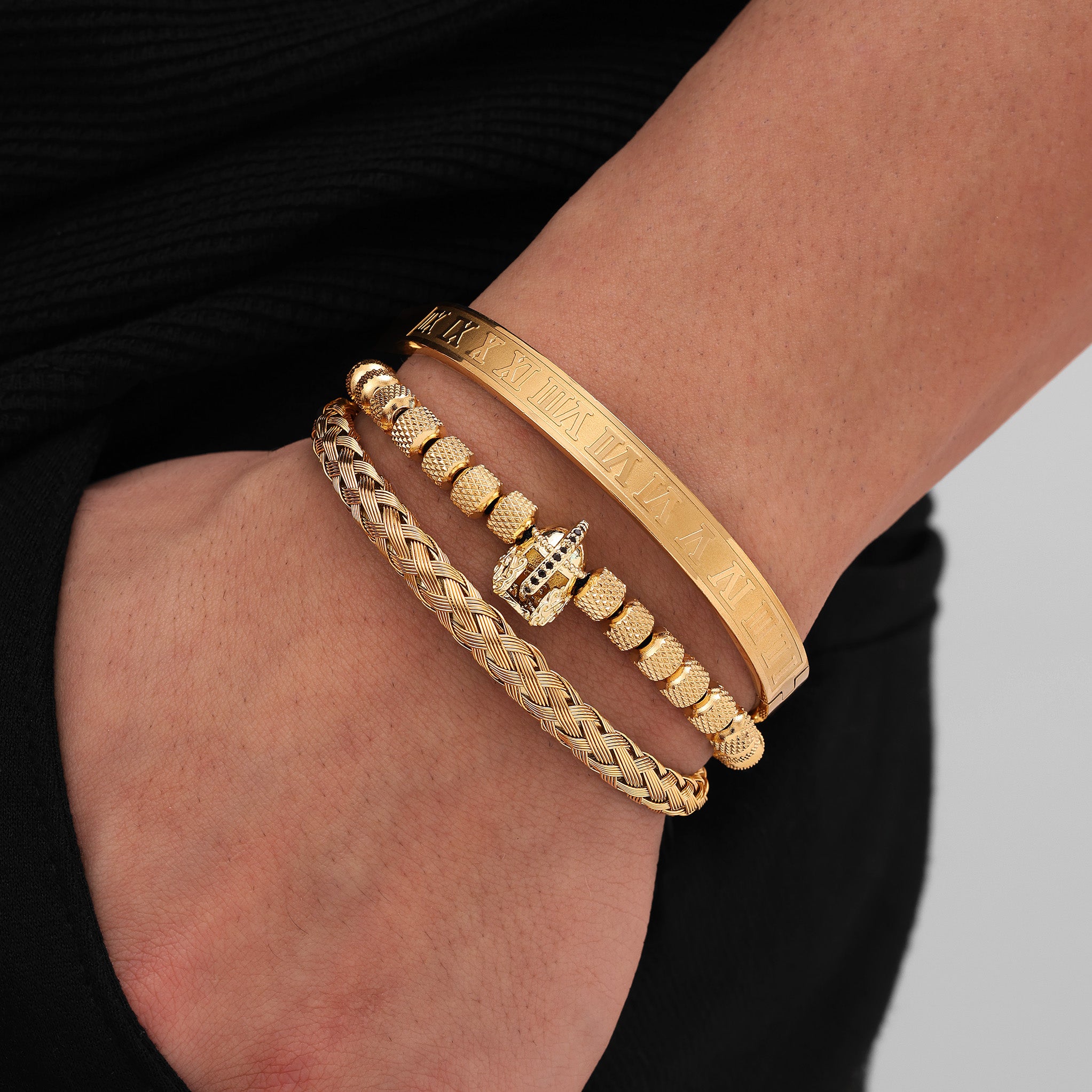 18K Gold Plated Trio Sparta Bracelets worn on wrist premium men’s bracelet stack lifestyle view