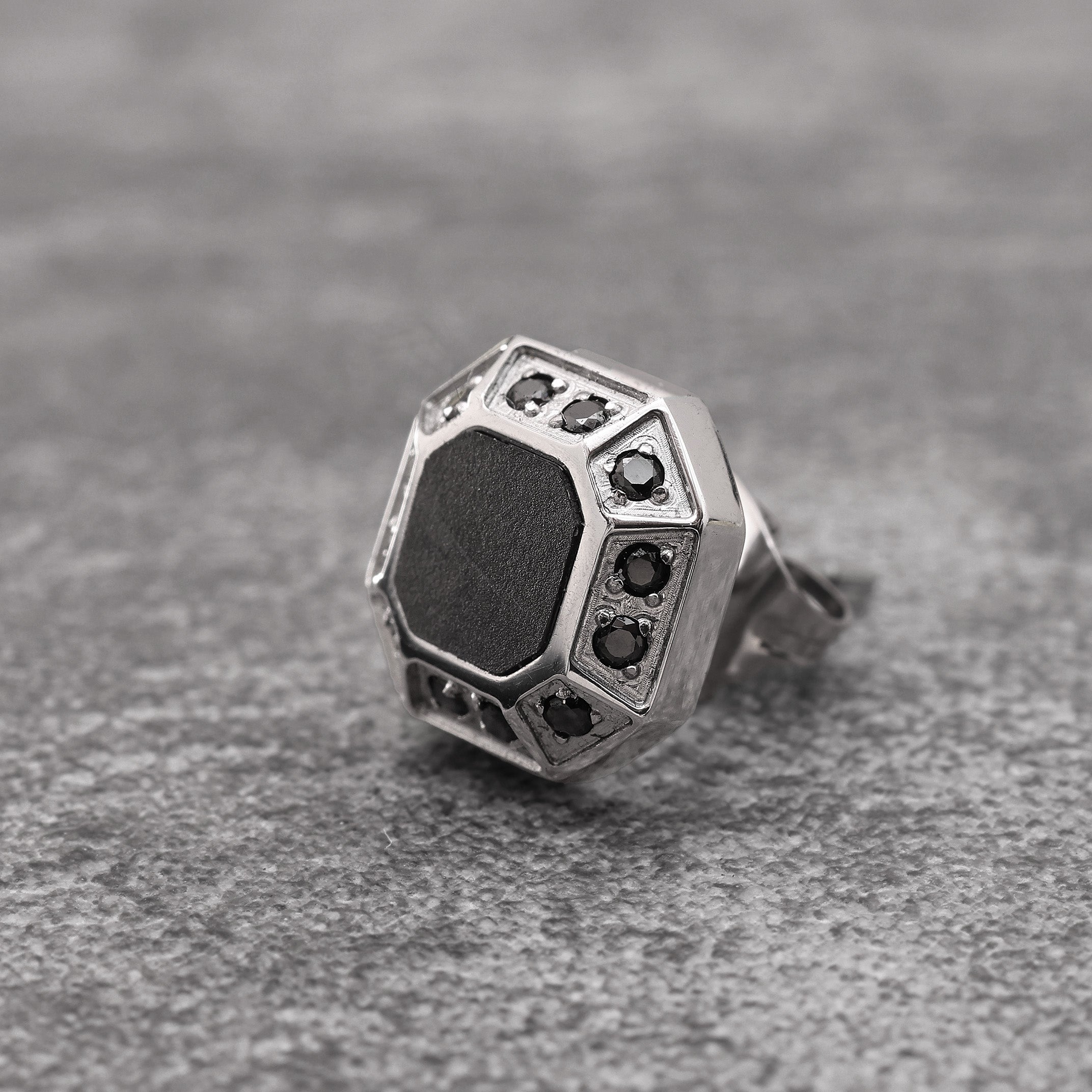 Close-up of Platinum Plated Diamond Hex Stud Earring showing black zircon stones and hexagonal design