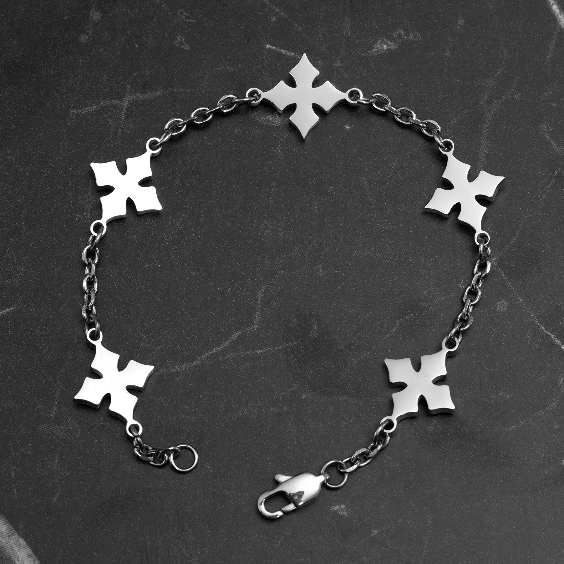 Close-up of silver Diamond Van Goth Bracelet showing black zircon stones and signature geometric design