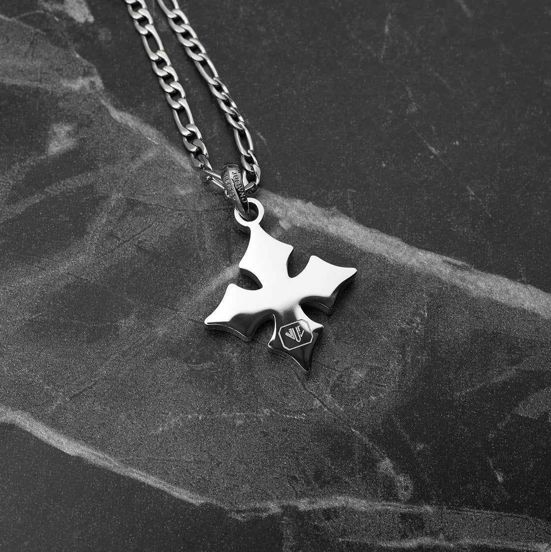 Close-up of Platinum Plated Diamond Van Goth Pendant showing white zircon stones and geometric cross design