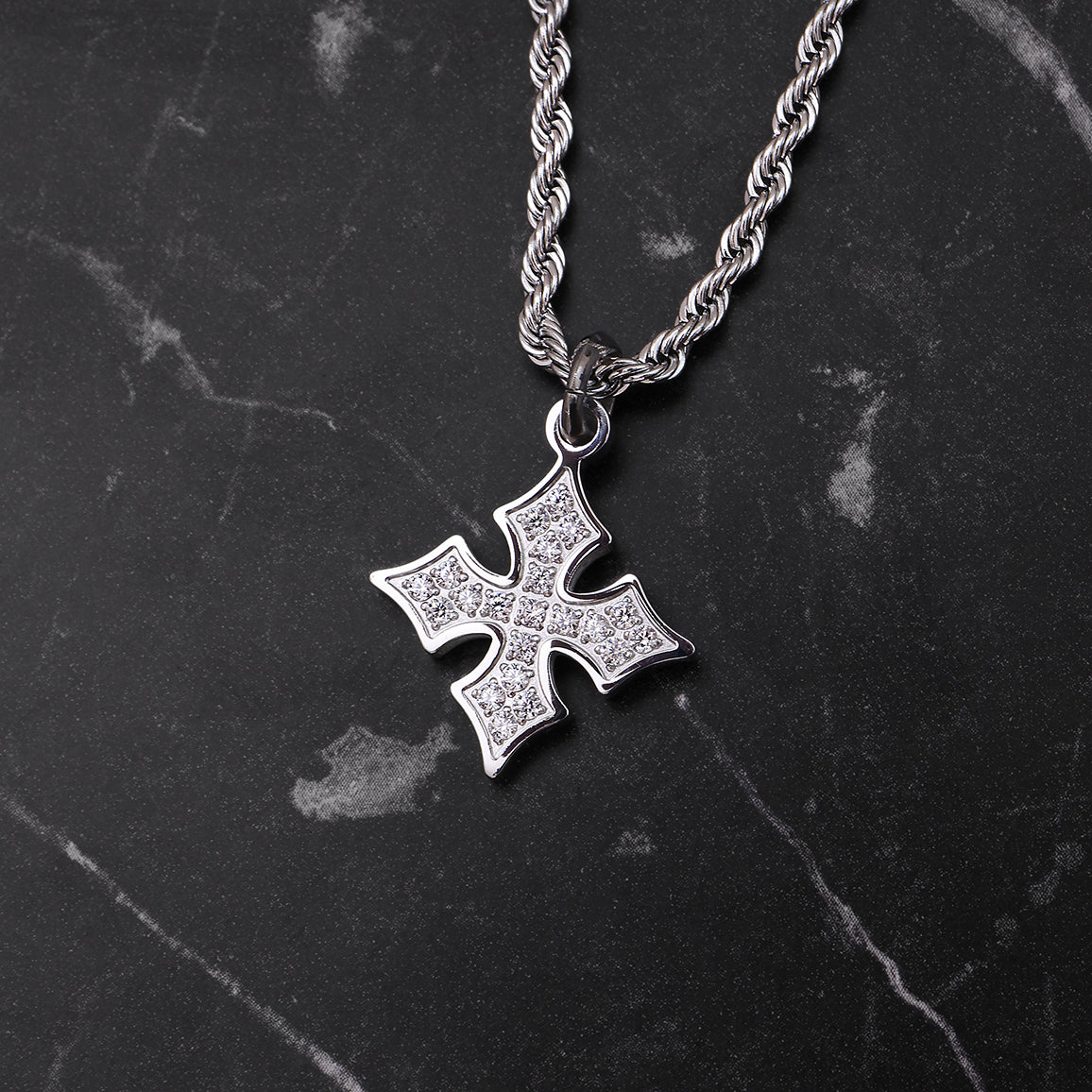 Close-up of Platinum Plated Diamond Van Goth Pendant showing white zircon stones and geometric cross design