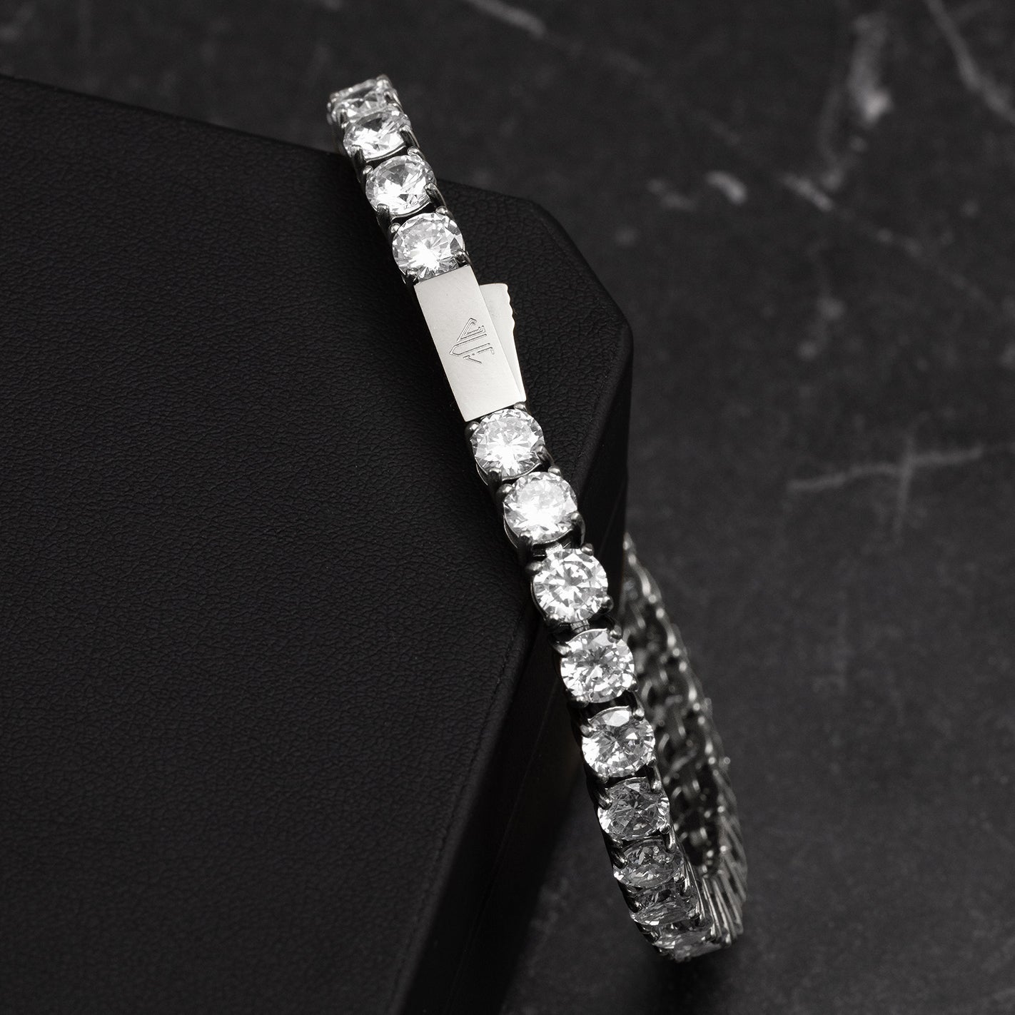 Luxury white gold tennis bracelet with prong-set links
