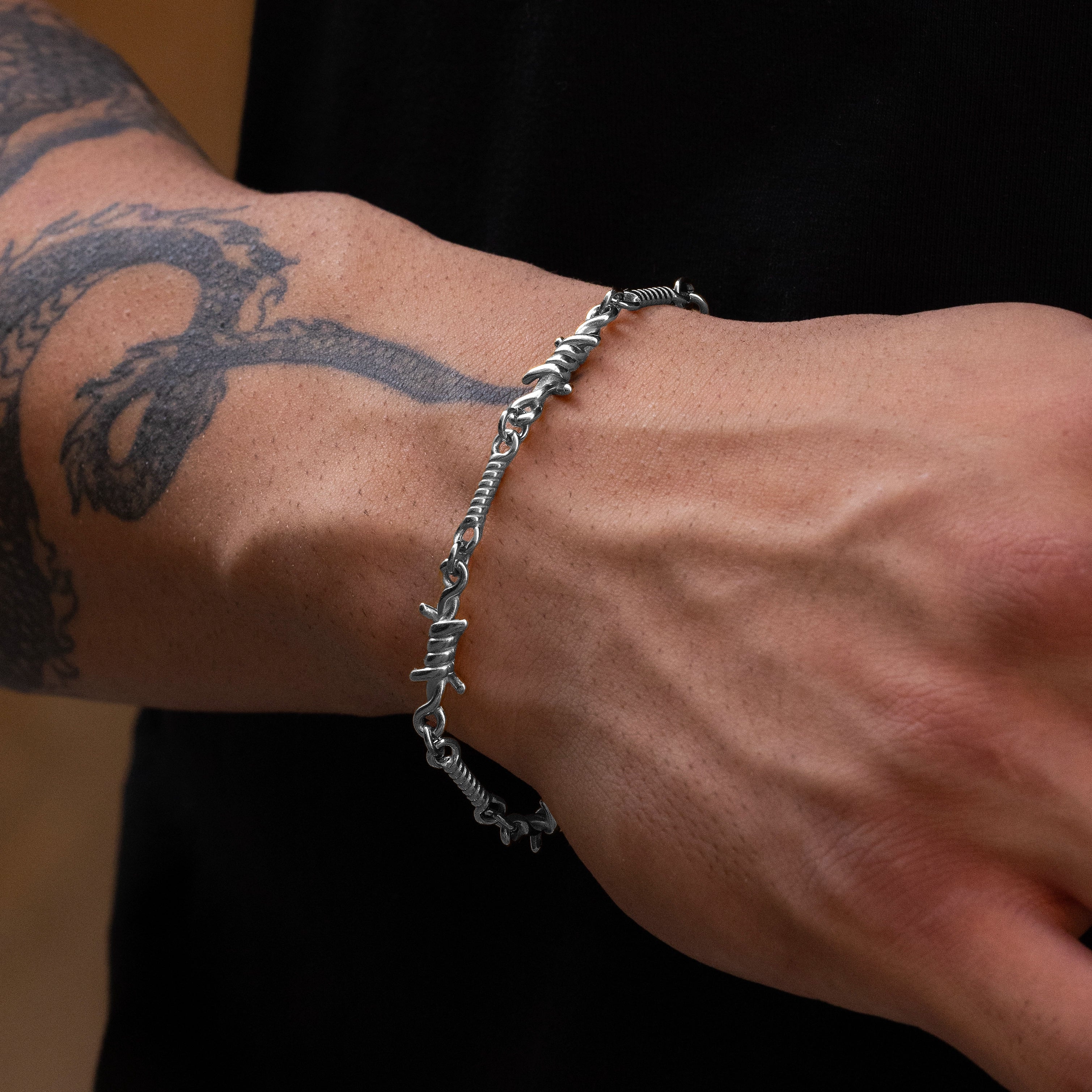 Premium men’s silver thorns bracelet with refined chain design